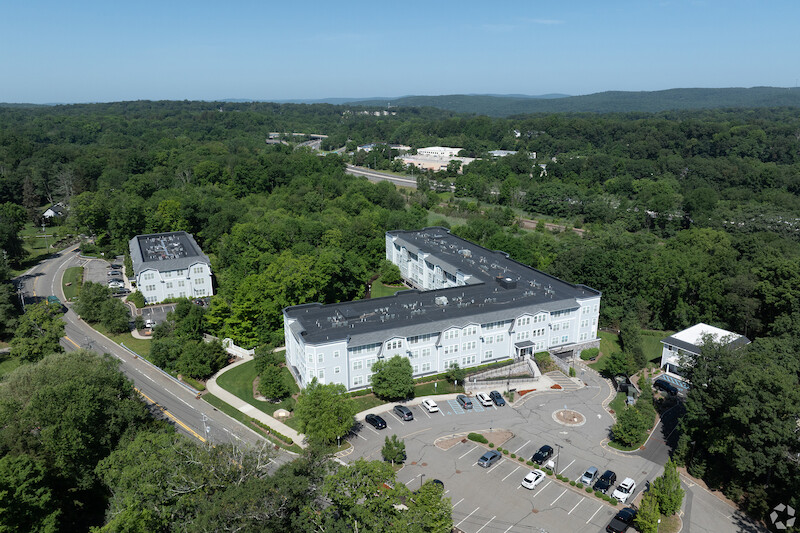 Aerial view of the property and grounds