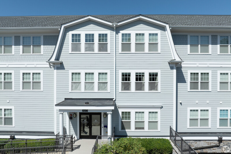 556 main entrance with branded Colonial Pointe doors