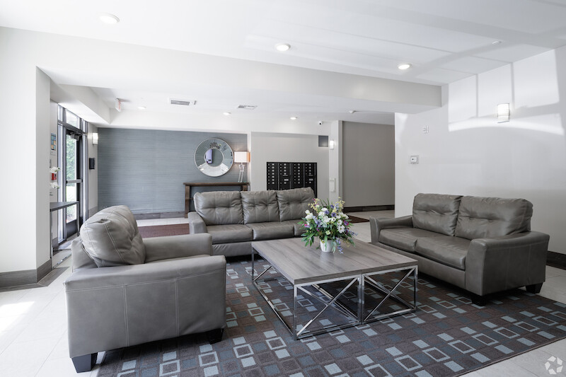 Building lobby waiting area with leather sofas